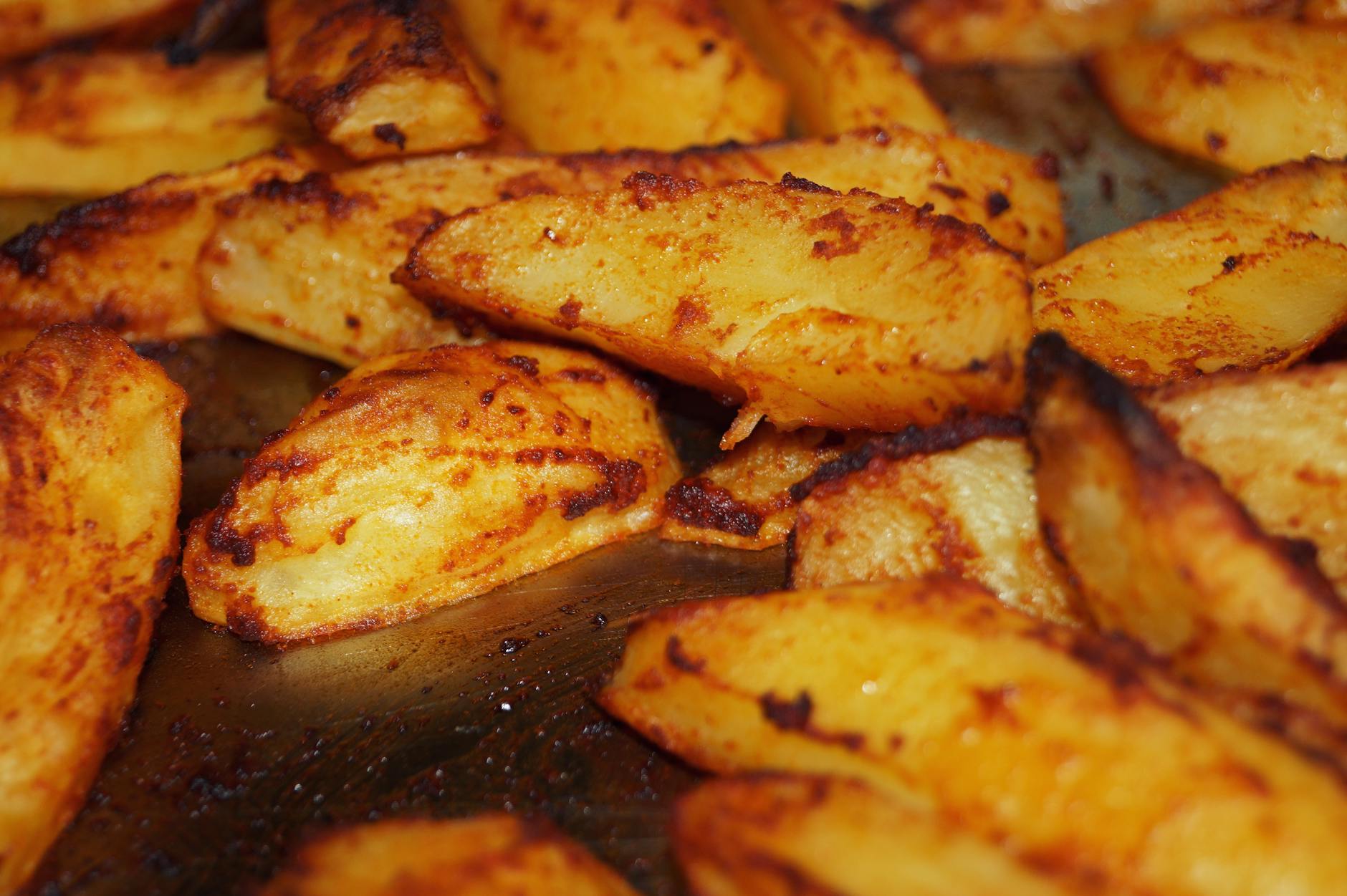 Golden roast potatoes fresh from the oven — crispy outside, fluffy inside.